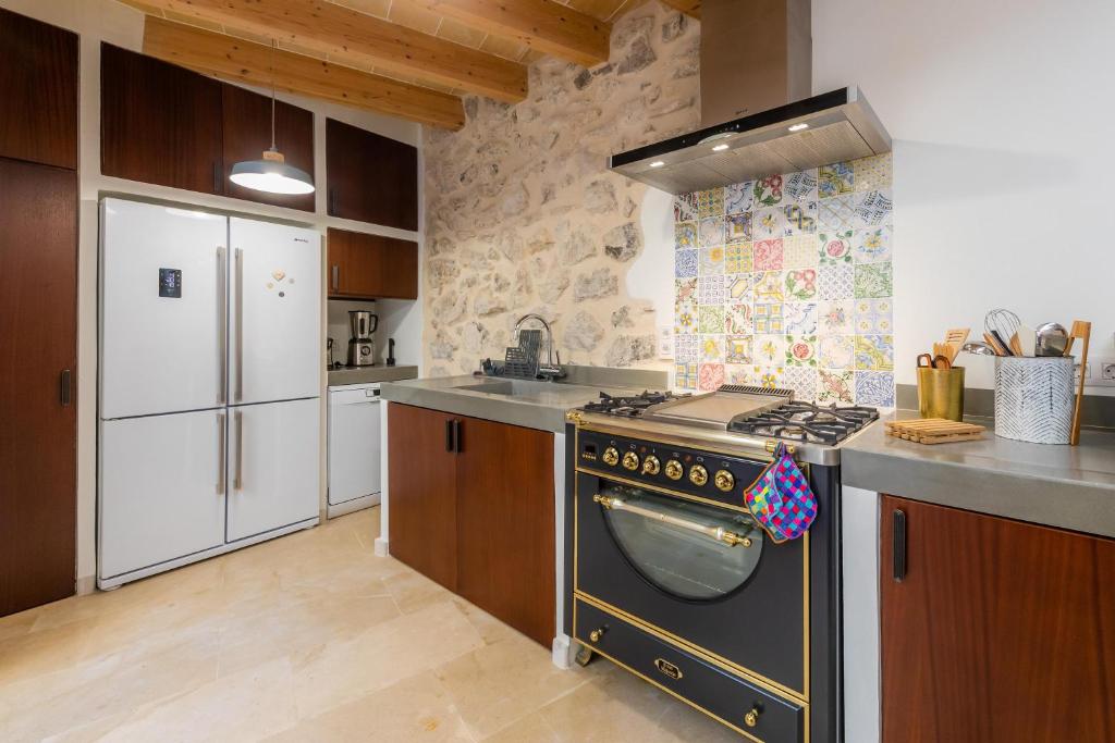 Kuchyň nebo kuchyňský kout v ubytování Casa Abeurador
