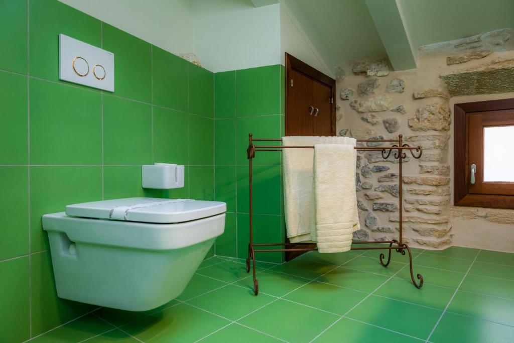 Koupelna v ubytování Casa Abeurador