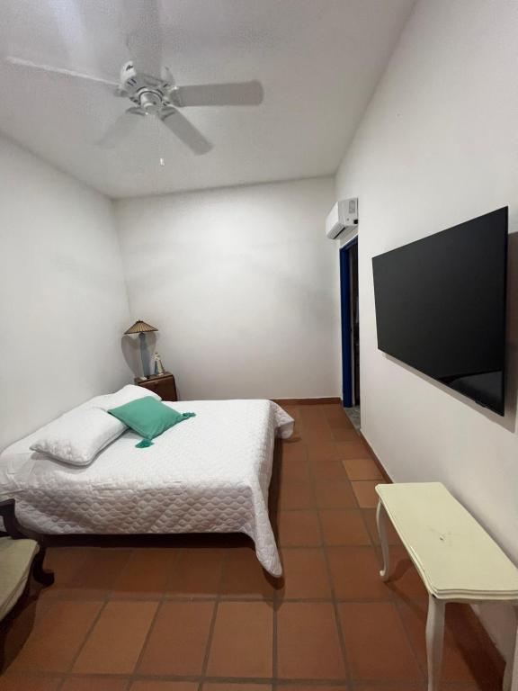 TV a/nebo společenská místnost v ubytování Hotel Casa Cuenca