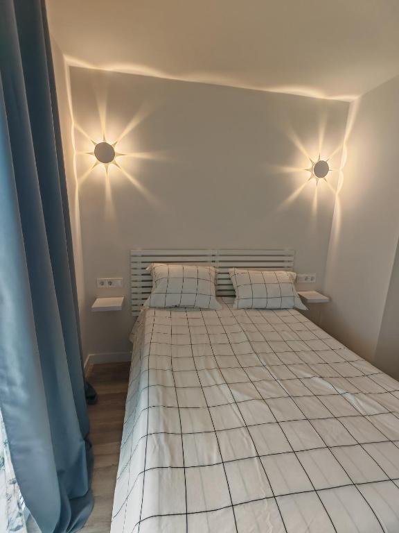Posteľ alebo postele v izbe v ubytovaní Apartament with sea view