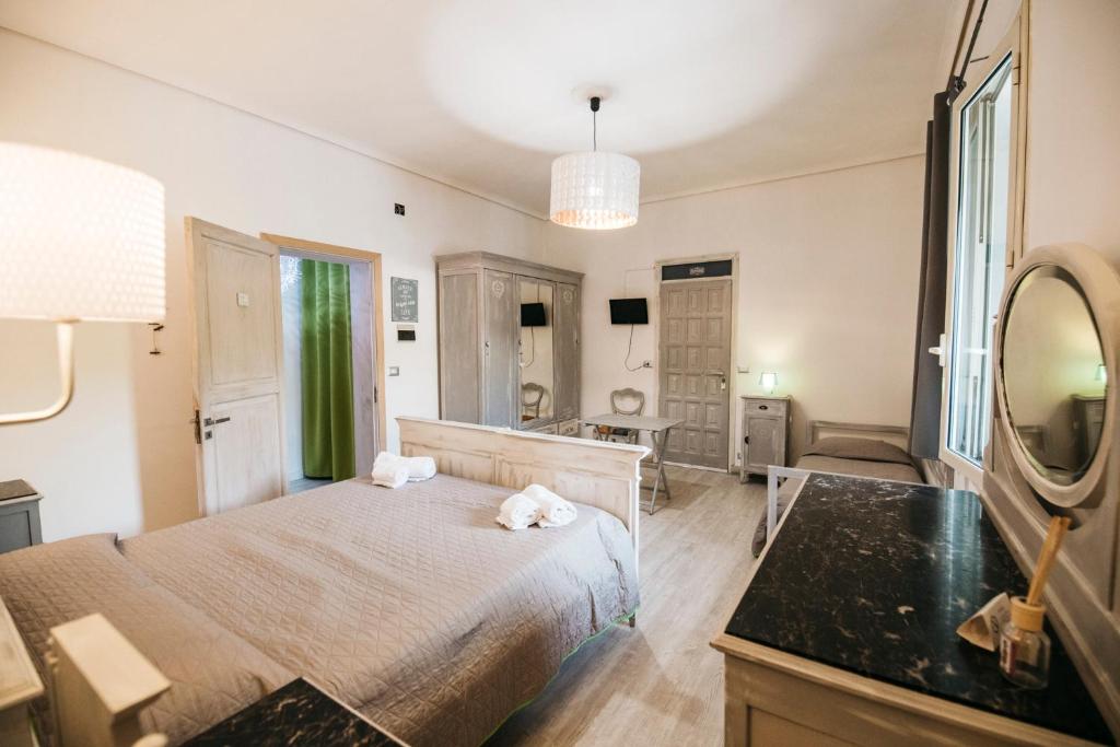 Postel nebo postele na pokoji v ubytování Villa Scilla e Cariddi