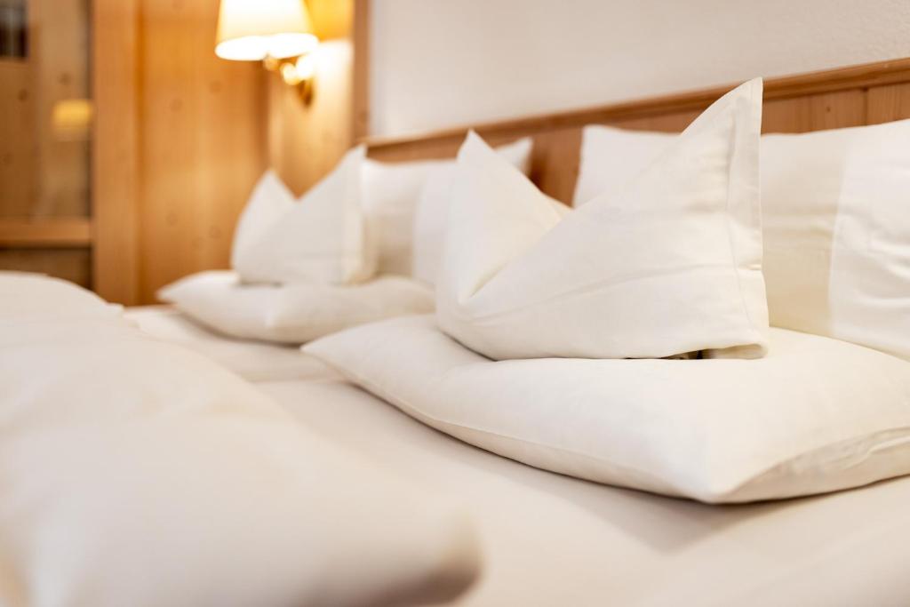 Postel nebo postele na pokoji v ubytování Hotel Rita