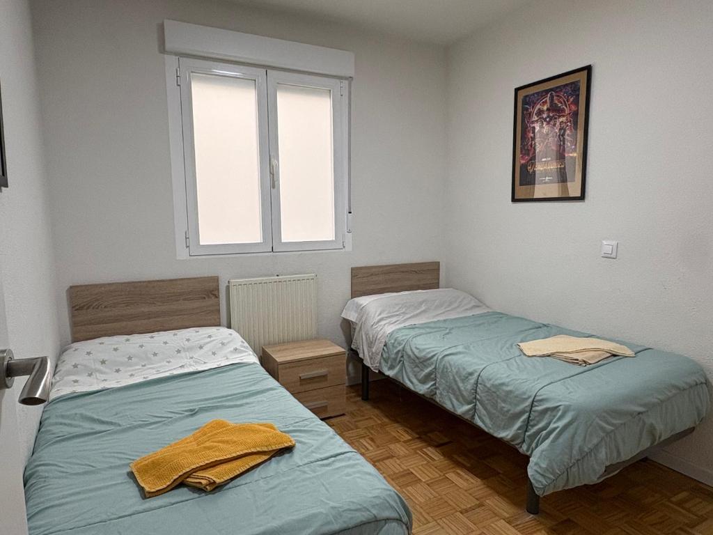 Postel nebo postele na pokoji v ubytování VUT Casa Trujillano