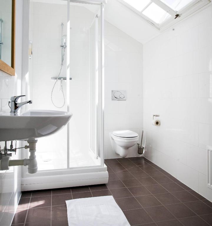Guesthouse Eleven Hotel - Quadruple Chambre