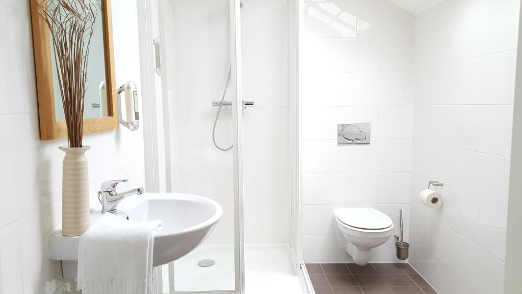 Guesthouse Eleven Hotel - Triple Chambre