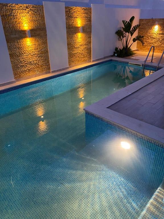 Bazén v ubytování Le Coin Paradisiaque nebo v jeho okolí