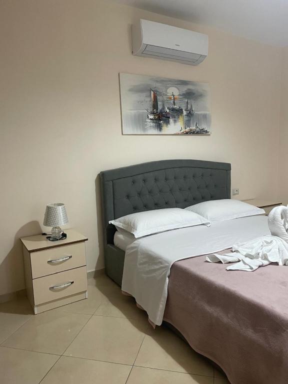 Postel nebo postele na pokoji v ubytování R HOTEL