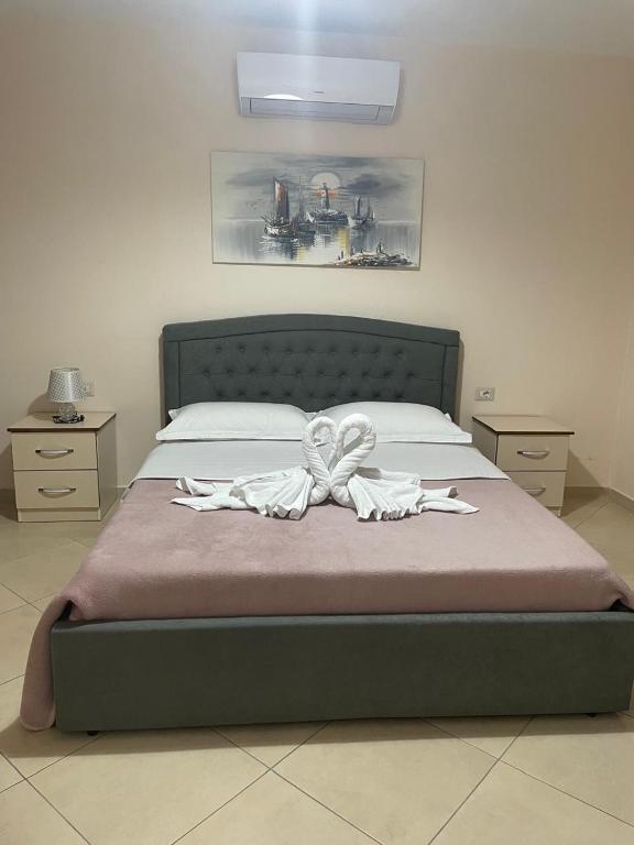 Postel nebo postele na pokoji v ubytování R HOTEL