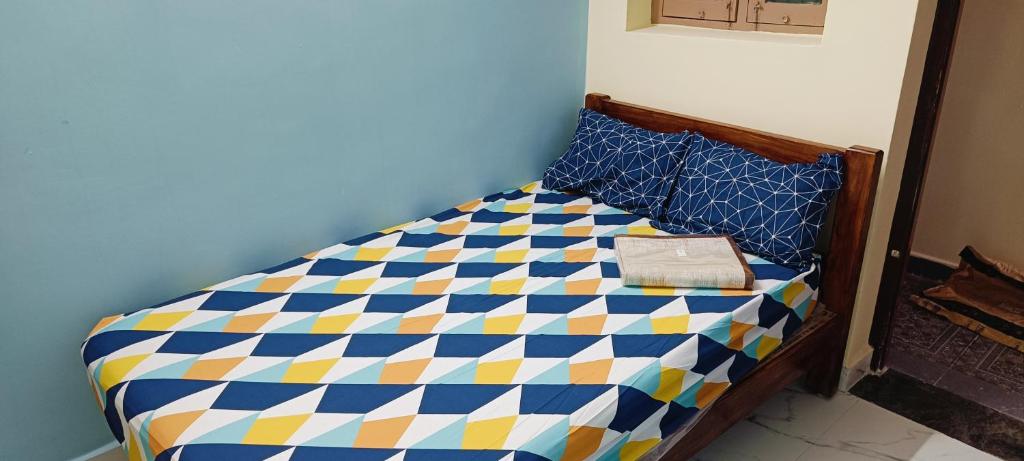 Postel nebo postele na pokoji v ubytování SA Residency