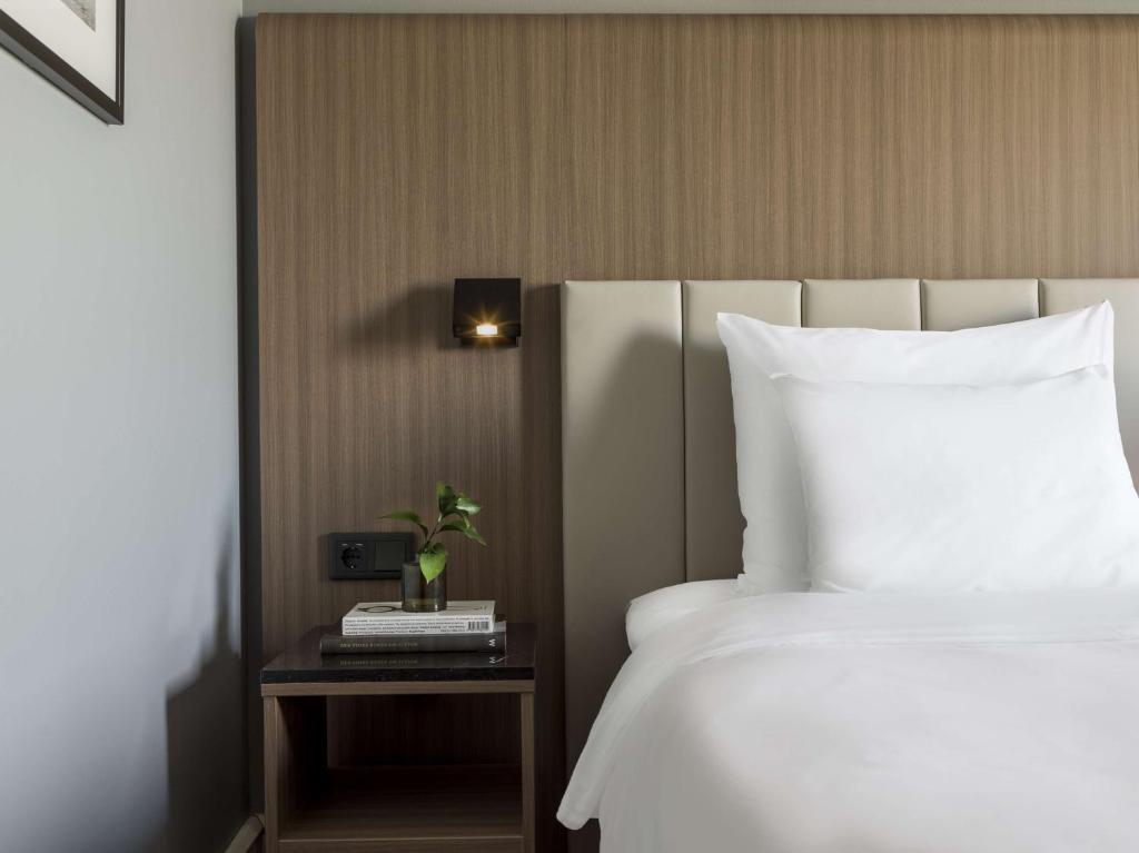 Postel nebo postele na pokoji v ubytování Radisson Blu Arlandia Hotel, Stockholm-Arlanda