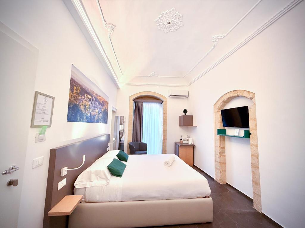 Postel nebo postele na pokoji v ubytování Ad Maiora - Design Rooms