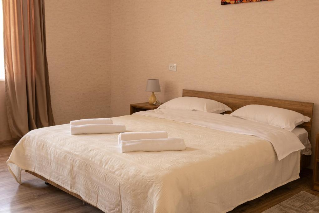 Postel nebo postele na pokoji v ubytování Bliss House