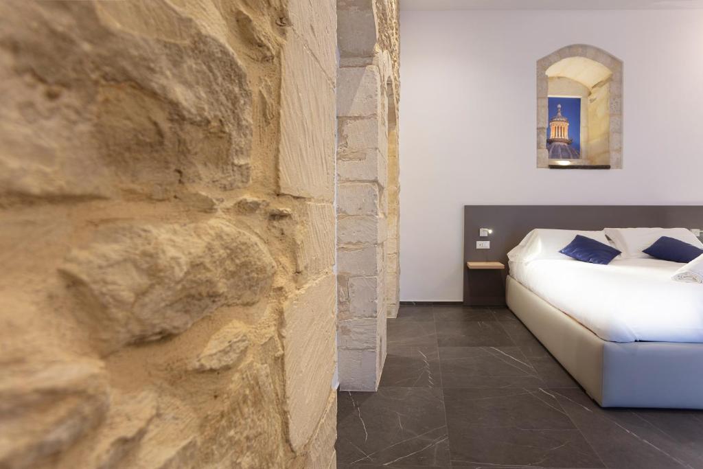 Postel nebo postele na pokoji v ubytování Ad Maiora - Design Rooms