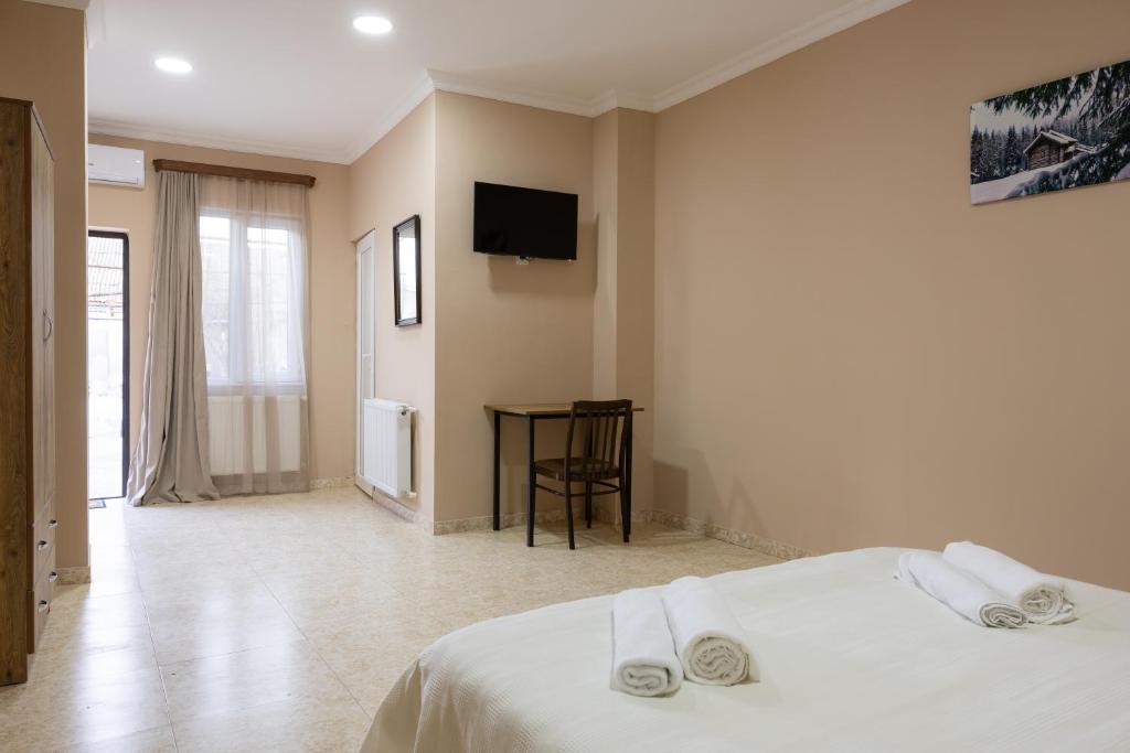 Postel nebo postele na pokoji v ubytování Bliss House