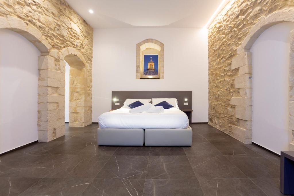Postel nebo postele na pokoji v ubytování Ad Maiora - Design Rooms