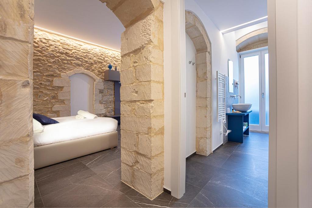 Postel nebo postele na pokoji v ubytování Ad Maiora - Design Rooms