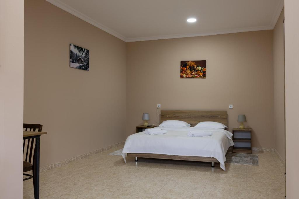Postel nebo postele na pokoji v ubytování Bliss House