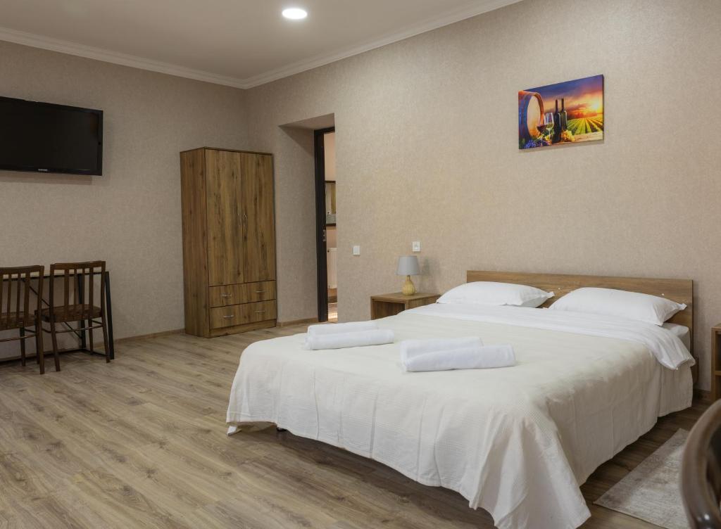 Postel nebo postele na pokoji v ubytování Bliss House