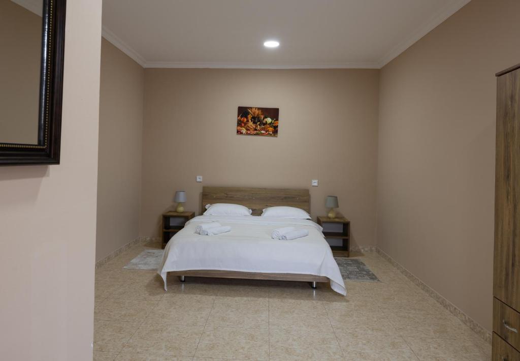 Postel nebo postele na pokoji v ubytování Bliss House