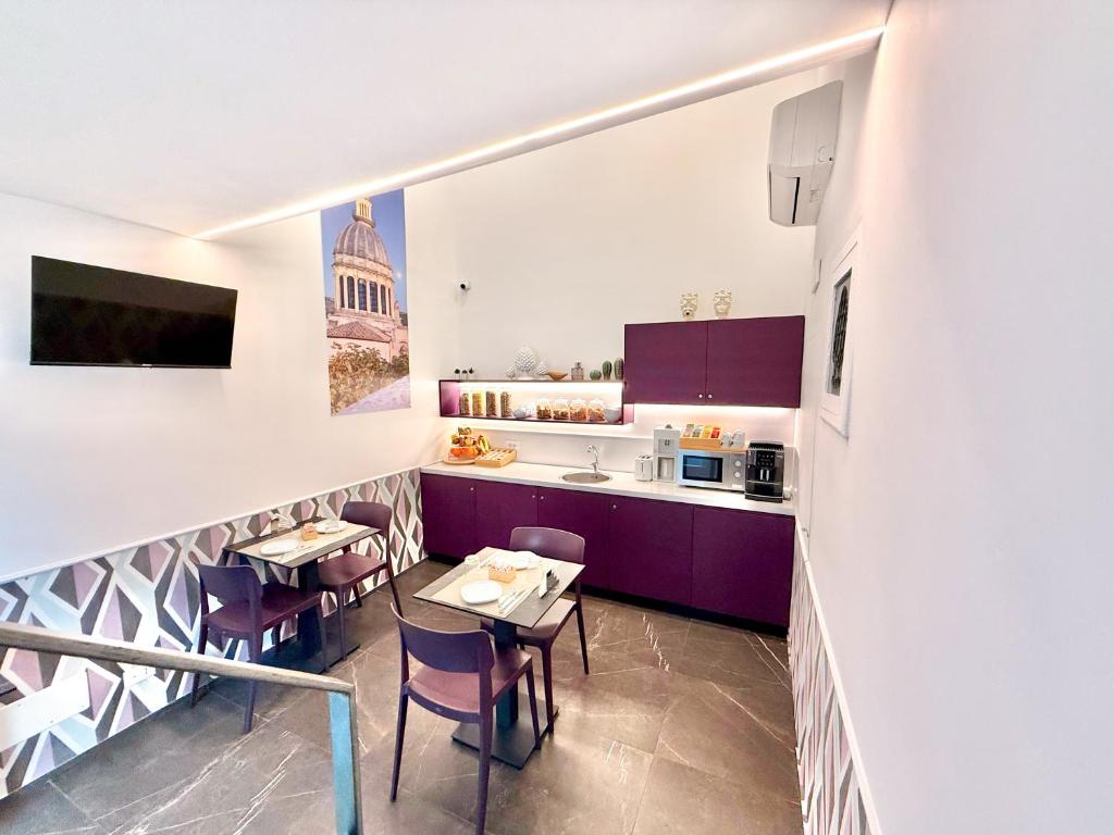 Kuchyň nebo kuchyňský kout v ubytování Ad Maiora - Design Rooms