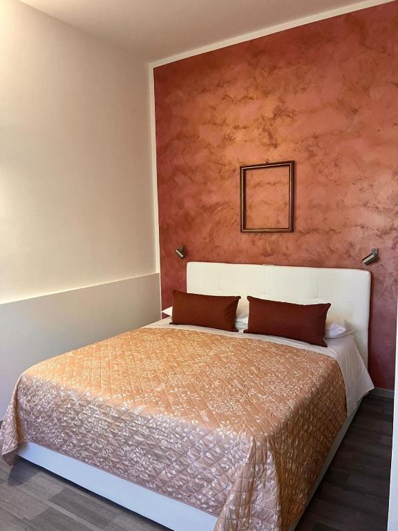Postel nebo postele na pokoji v ubytování Harmony Lake Sirmione