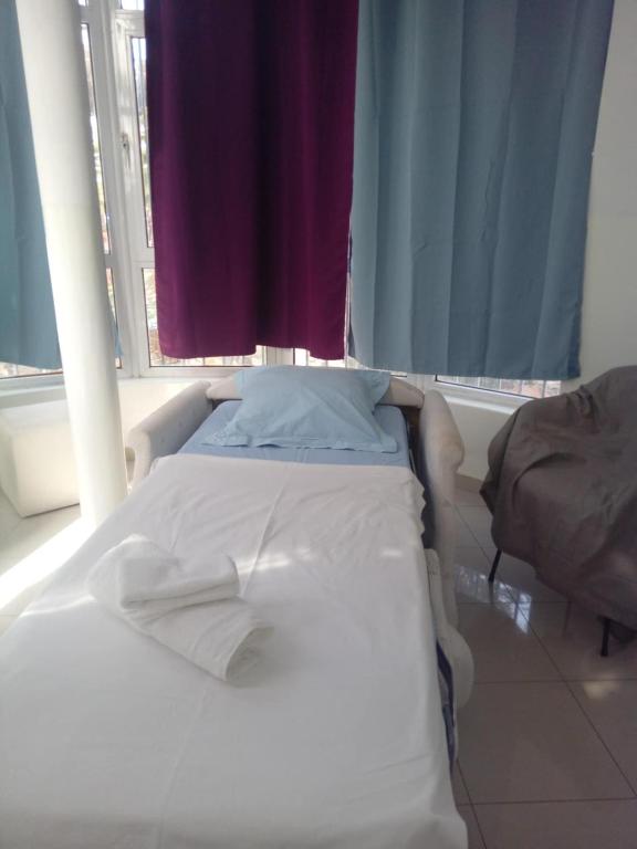Postel nebo postele na pokoji v ubytování Maison Residencial casa de ferias