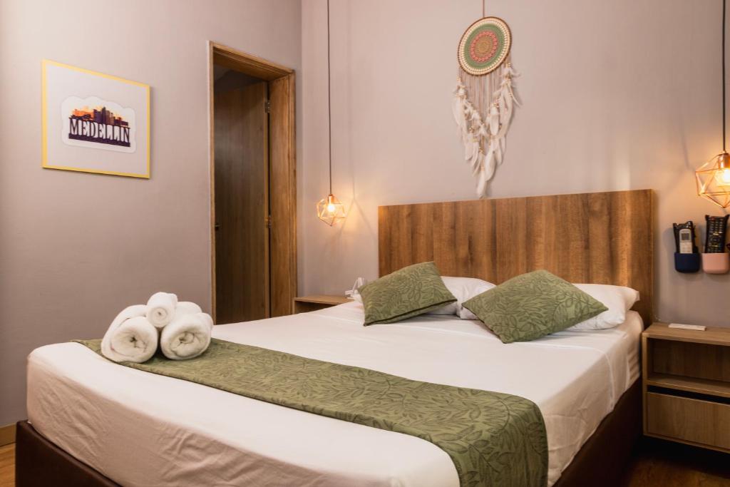 Postel nebo postele na pokoji v ubytování Hotel Casa 73 Deluxe