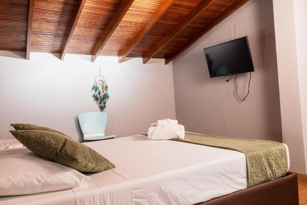 Postel nebo postele na pokoji v ubytování Hotel Casa 73 Deluxe