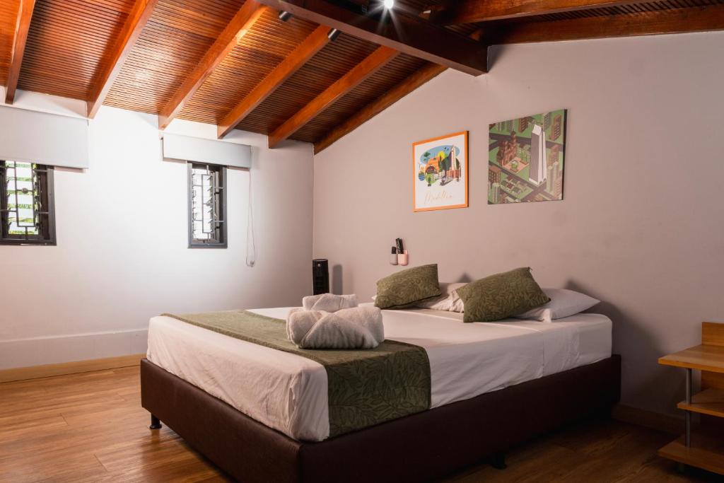 Postel nebo postele na pokoji v ubytování Hotel Casa 73 Deluxe