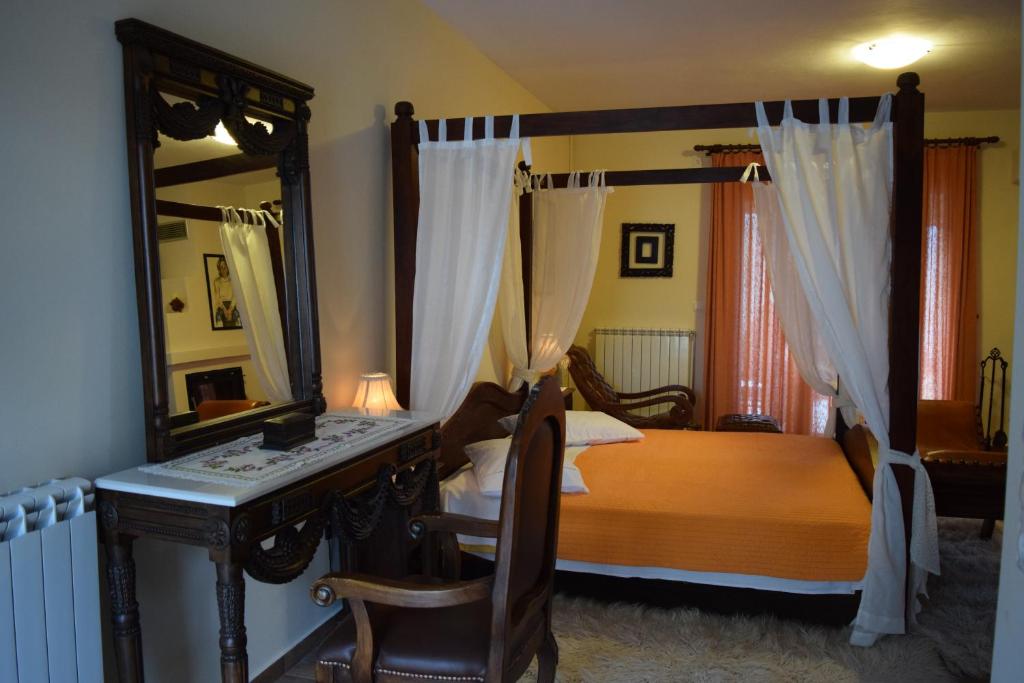Postel nebo postele na pokoji v ubytování Flygonion Guesthouse