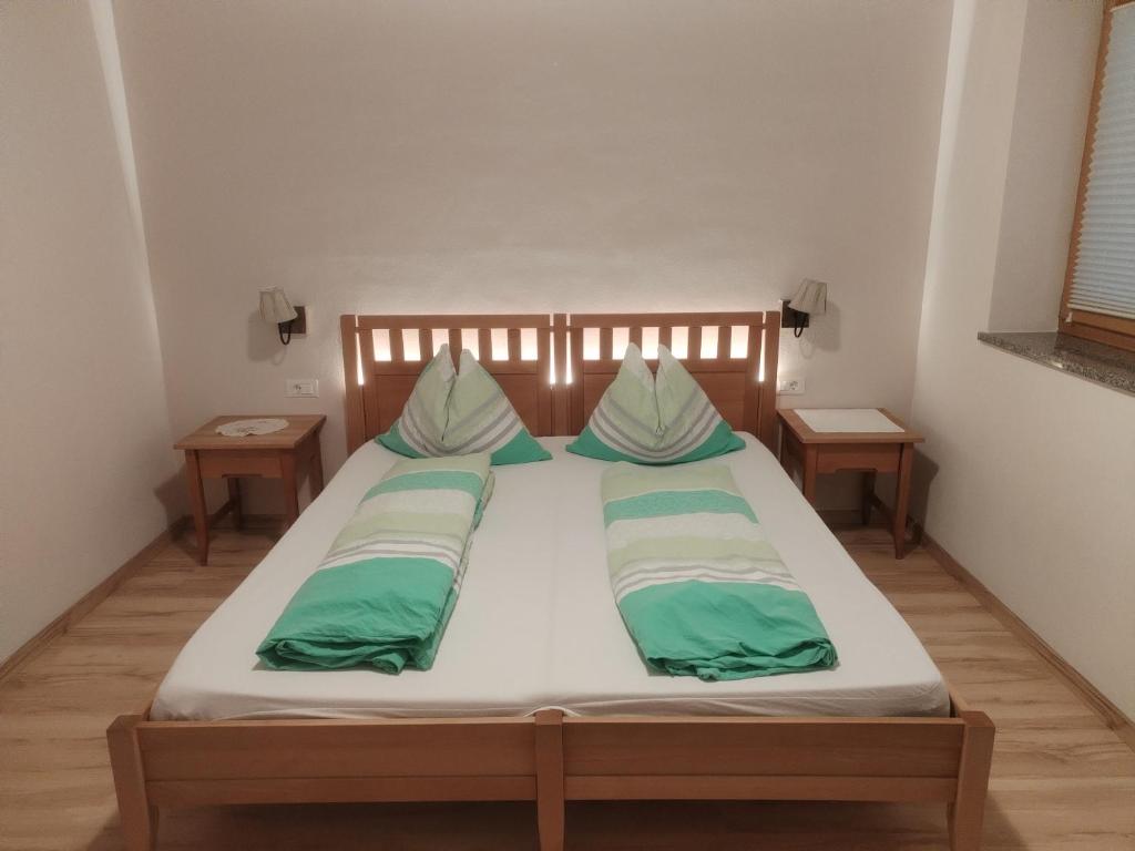 Postel nebo postele na pokoji v ubytování Greiterhof Partschins