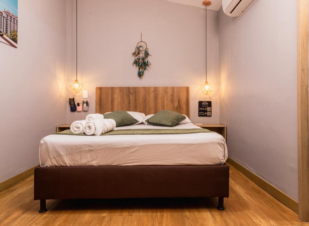 Postel nebo postele na pokoji v ubytování Hotel Casa 73 Deluxe