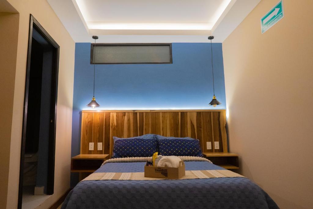 Postel nebo postele na pokoji v ubytování Casa Tsumbak