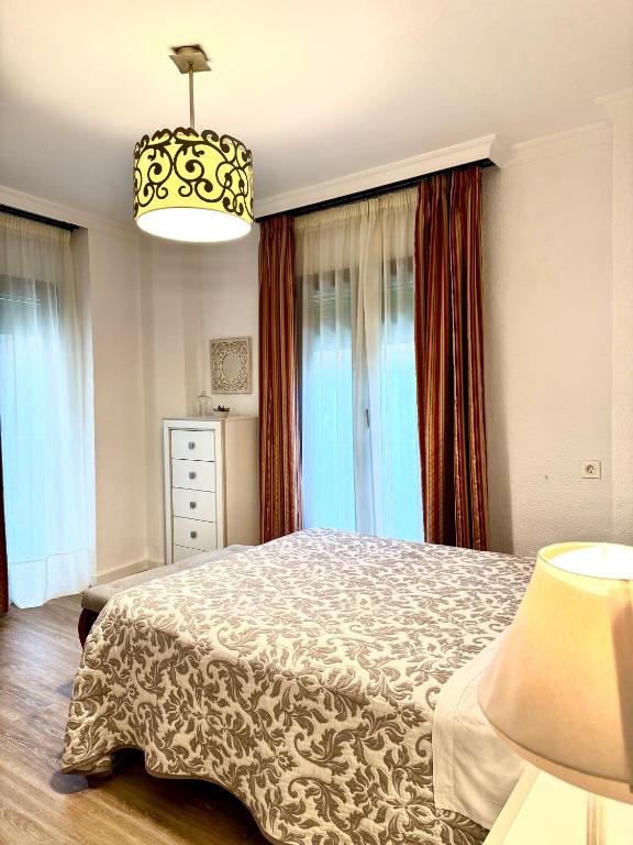 Postel nebo postele na pokoji v ubytování Pension Zurita