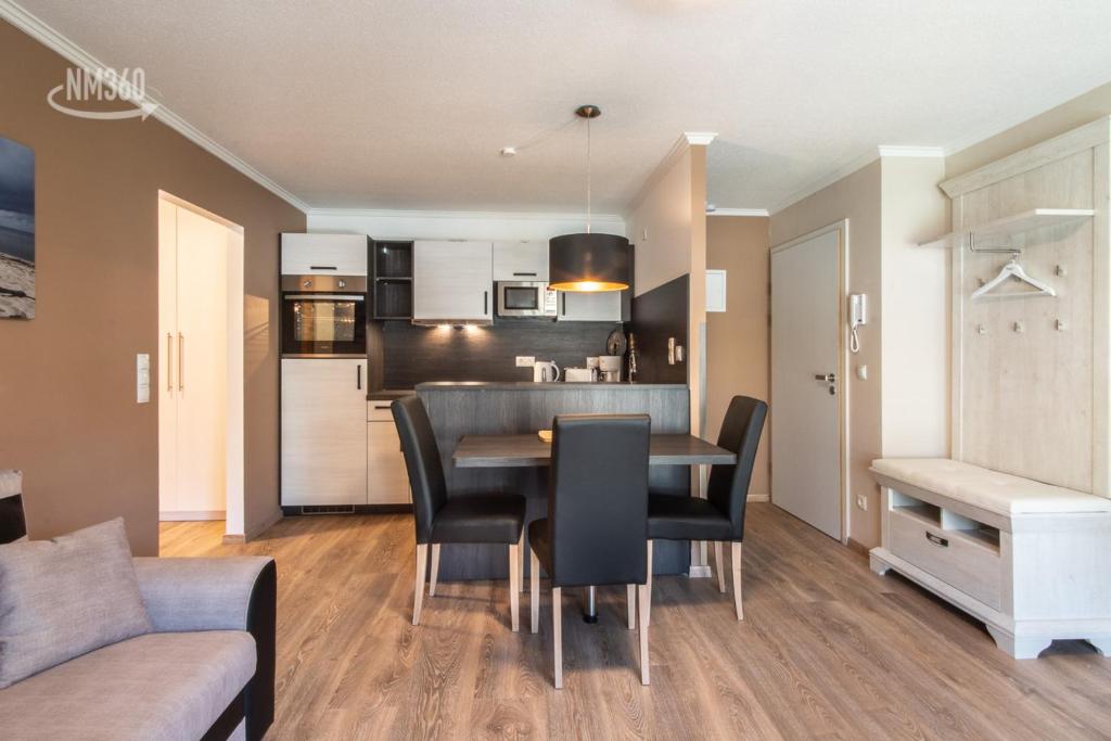 Kuchyň nebo kuchyňský kout v ubytování Traumhaftes Appartement - Odins Blick Wohnung 13 , Sauna und Privatstrand, Blick zur Ostsee