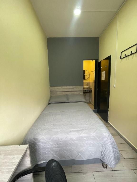 Postel nebo postele na pokoji v ubytování Hostel Quinta Camacho