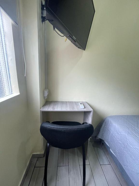 TV a/nebo společenská místnost v ubytování Hostel Quinta Camacho