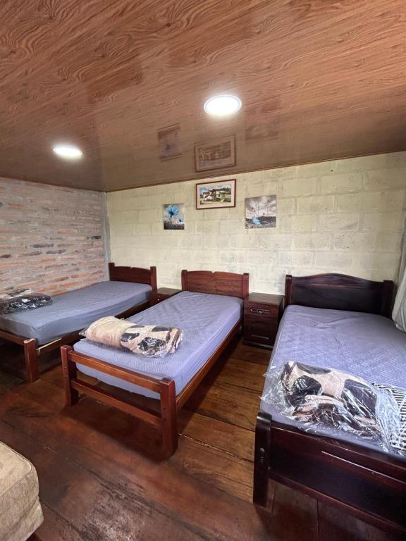 Postel nebo postele na pokoji v ubytování Quinta Paraíso Escondido