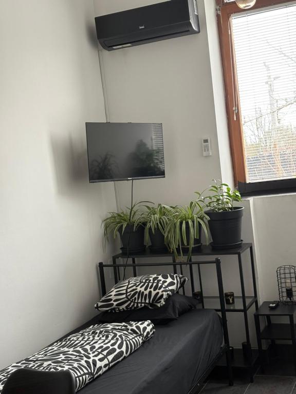 Postel nebo postele na pokoji v ubytování INDUSTRIAL ZONE-STUDIO 3