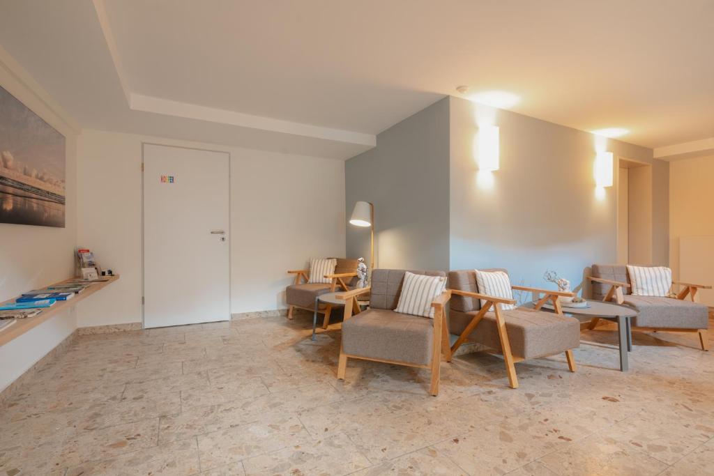 Posezení v ubytování Haus Bielefeld Zimmer 25a