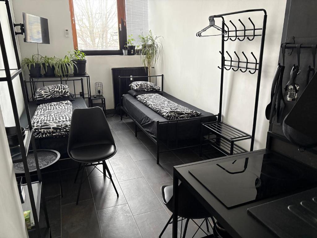 Postel nebo postele na pokoji v ubytování INDUSTRIAL ZONE-STUDIO 3