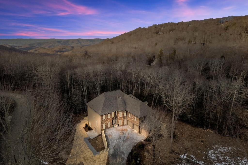 an overhead view of a house in the woods at Group Getaway! 8,000-Sq-Ft Gem, Arcade + Theater in Beech Mountain