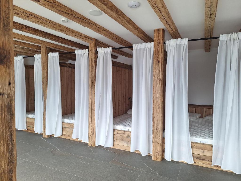 Postel nebo postele na pokoji v ubytování Gasthof Videgg