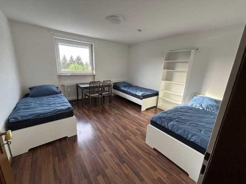 Postel nebo postele na pokoji v ubytování Penthouse Haar