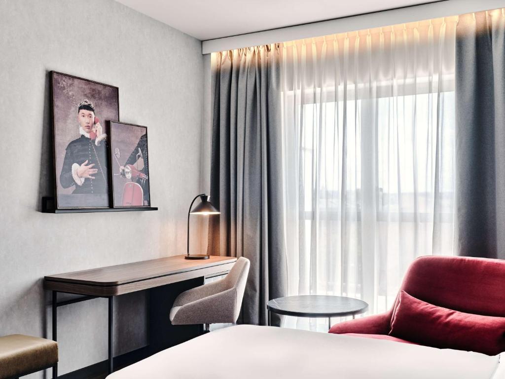 Radisson RED Hotel & Radisson RED Apartments, Krakówにあるベッド