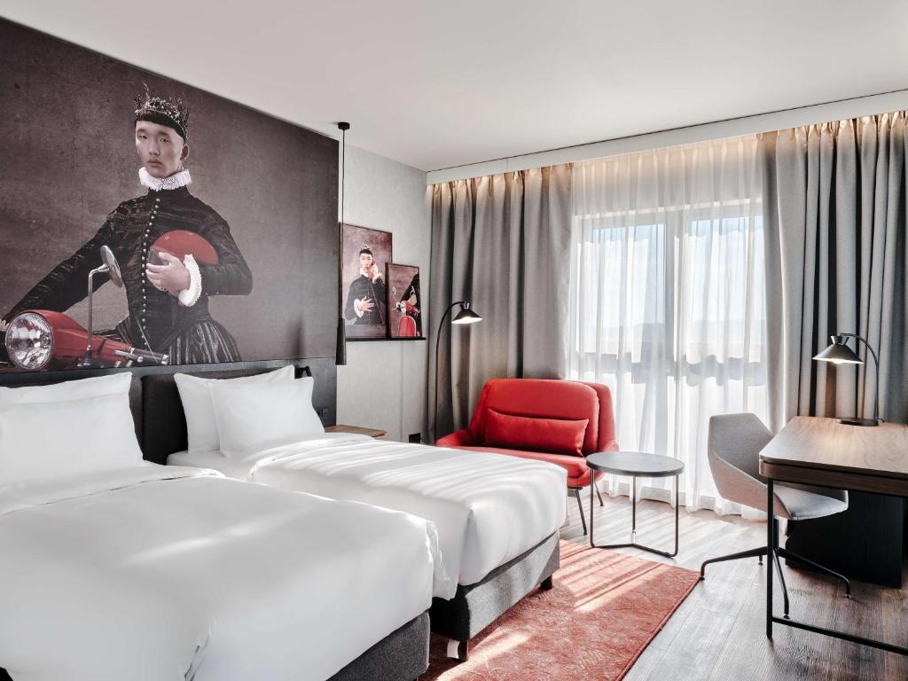 Radisson RED Hotel & Radisson RED Apartments, Krakówにあるベッド