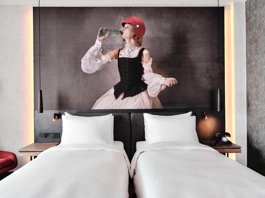 Radisson RED Hotel & Radisson RED Apartments, Krakówにあるベッド