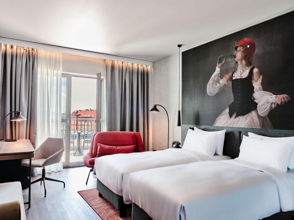 Radisson RED Hotel & Radisson RED Apartments, Krakówにあるベッド