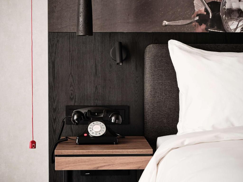 Radisson RED Hotel & Radisson RED Apartments, Krakówにあるベッド