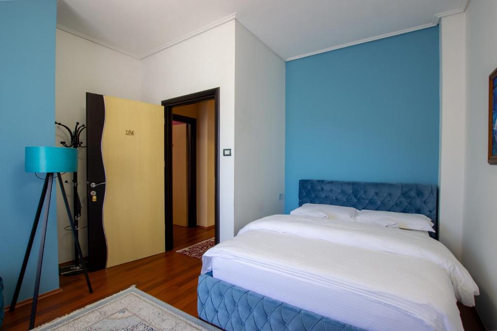 Postel nebo postele na pokoji v ubytování Bora Hotel
